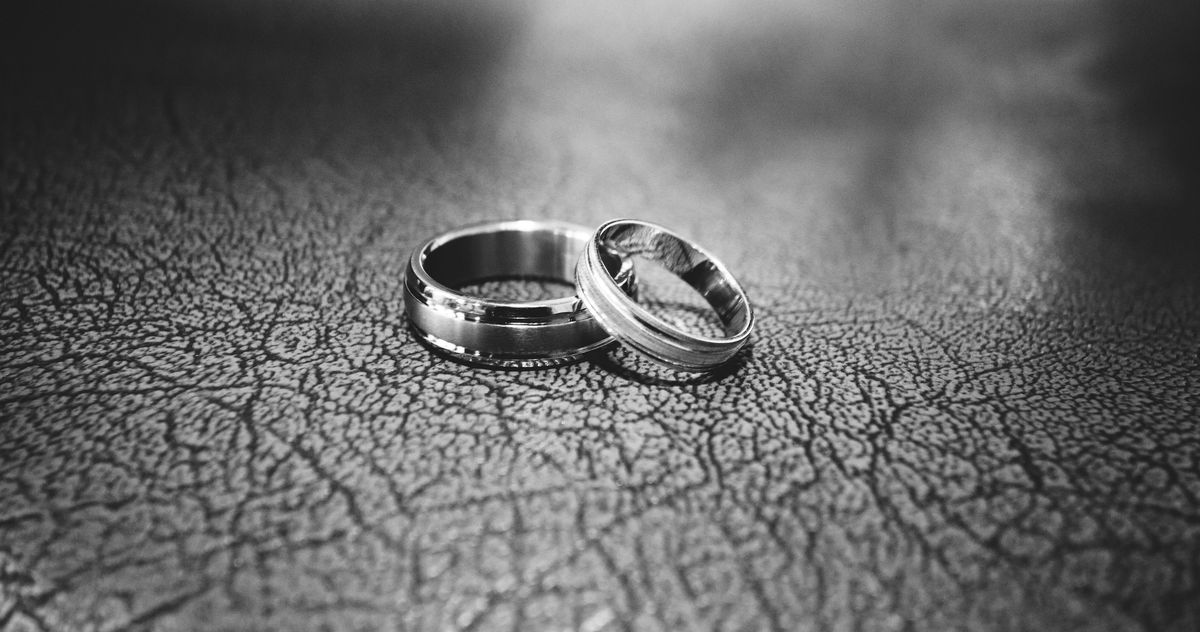 close-up-of-wedding-rings-on-floor-17834.jpg