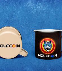 A mug with the symbol of Wolfcoin shining brightly